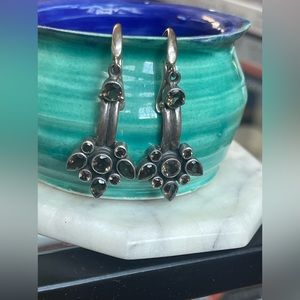 Silver earrings with brown crystals